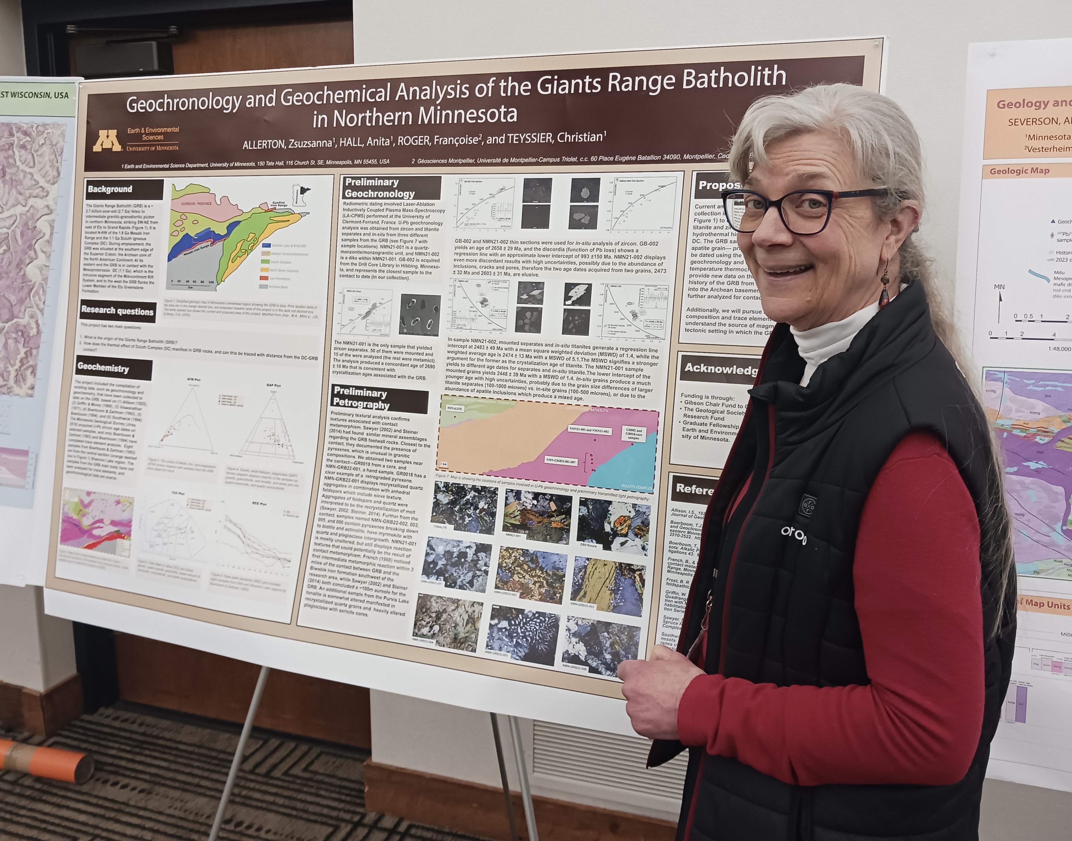 image of a woman in front of a research poster